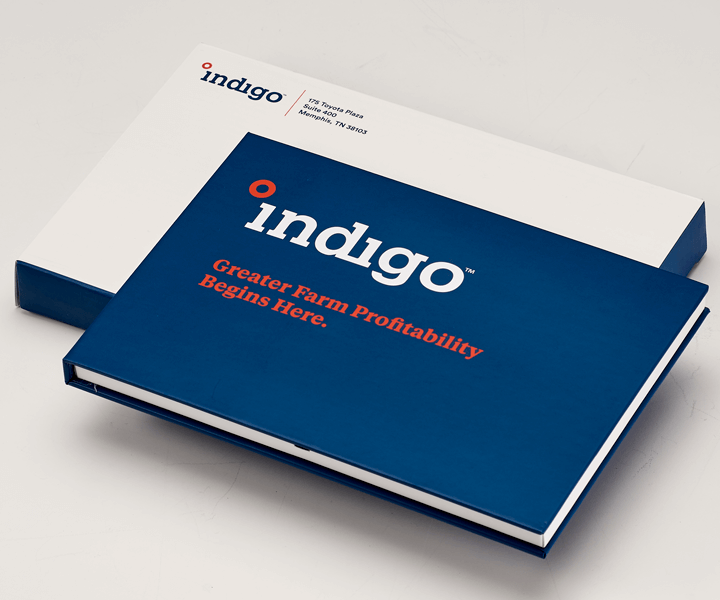 A navy blue book or box with